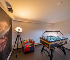 Appartement pour 4 personnes à Barvaux : hébergement moderne avec sauna, jardin et lit bébé