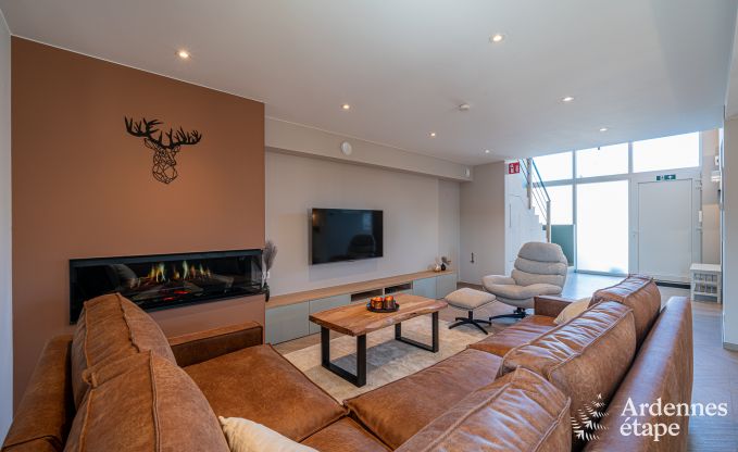 Charmante maison de vacances  Bastogne : sjour confortable pour 8 personnes avec jardin priv et station de recharge