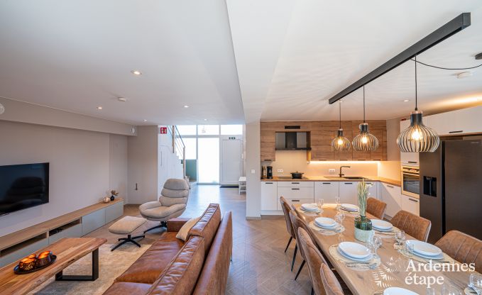 Charmante maison de vacances  Bastogne : sjour confortable pour 8 personnes avec jardin priv et station de recharge