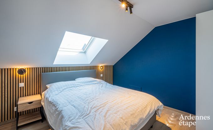 Charmante maison de vacances  Bastogne : sjour confortable pour 8 personnes avec jardin priv et station de recharge