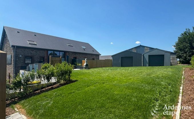 Charmante maison de vacances  Bastogne : sjour confortable pour 8 personnes avec jardin priv et station de recharge