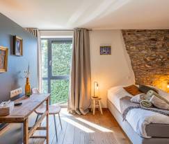 Grande maison de vacances à Libin pour 15 personnes avec salles de bains privées et cuisine professionnelle