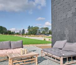 Spacieuse maison de vacances à Libramont pour 20 personnes avec salle de jeux, jardin et barbecue en Ardenne