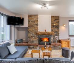 Maison de vacances spacieuse et tout confort à Saint-Hubert en Ardenne pour 12 personnes avec jardin privé et proche des activités touristiques