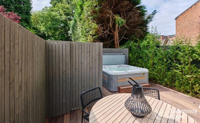 Charmante maison de vacances  Spa avec 2 chambres, espace de dtente et terrasse prive avec jacuzzi