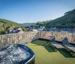 Spacieux loft luxueux à Trois-Ponts pour 5 personnes avec 2 chambres, 2 salles de bains, jacuzzi et terrasse privée